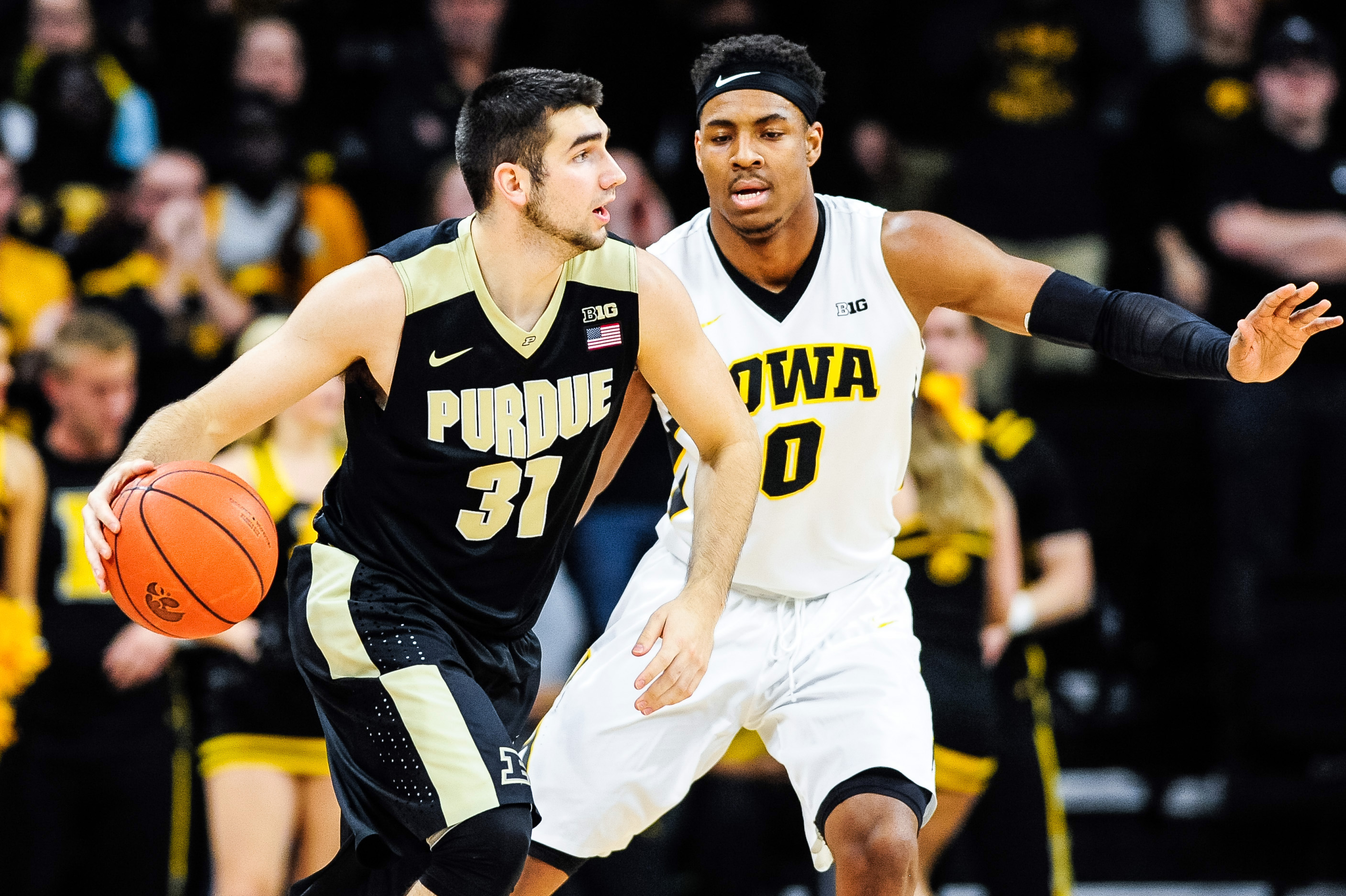 Jan 12, 2017; Iowa City, IA, USA; Purdue Boilermakers guard Dakota Mathias (31) is defended by Iowa Hawkeyes forward Ahmad Wagner (0) during the second half at Carver-Hawkeye Arena. Iowa won 83-78. Mandatory Credit: Jeffrey Becker-USA TODAY Sports