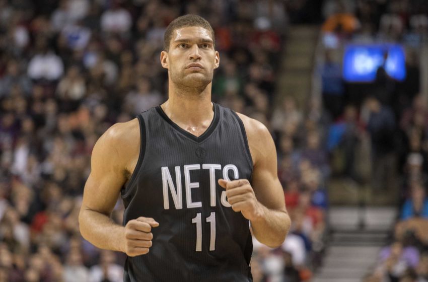 Jan 13, 2017; Toronto, Ontario, CAN; Brooklyn Nets center Brook Lopez (11) walks towards the bench during the fourth quarter in a game against the Toronto Raptors at Air Canada Centre. The Toronto Raptors won 132-113. Mandatory Credit: Nick Turchiaro-USA TODAY Sports