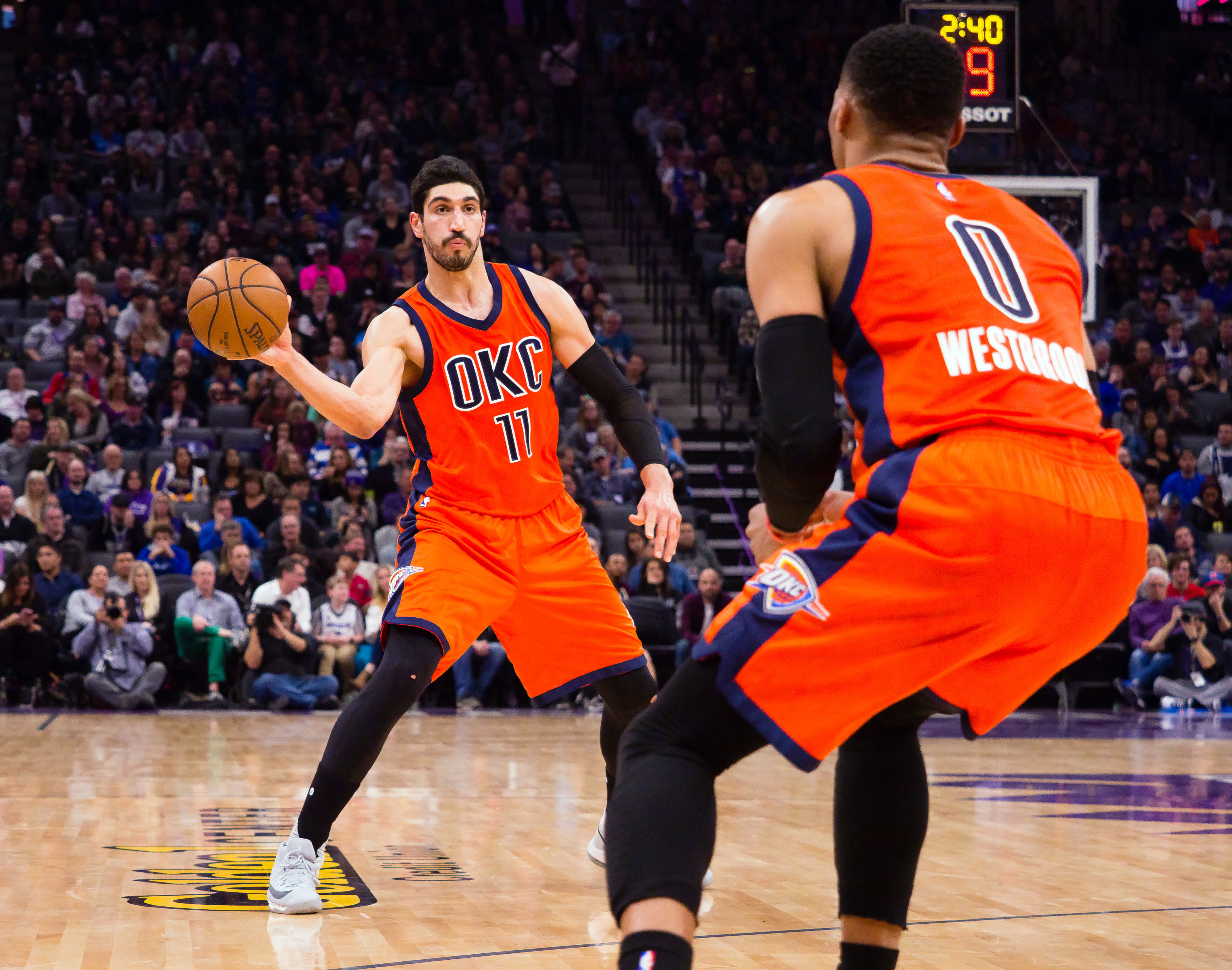 Jan 15, 2017; Sacramento, CA, USA; Oklahoma City Thunder center Enes Kanter (11) passes the ball to guard Russell Westbrook (0) during the second quarter at Golden 1 Center. Mandatory Credit: Kelley L Cox-USA TODAY Sports