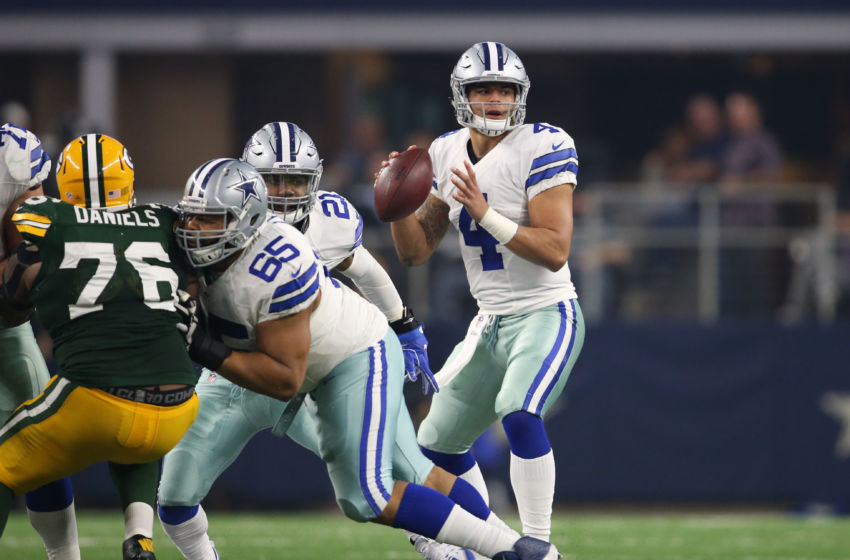 Jan 15, 2017; Arlington, TX, USA; Dallas Cowboys quarterback Dak Prescott (4) throws in the pocket against the Green Bay Packers in the NFC Divisional playoff game at AT&T Stadium. Mandatory Credit: Matthew Emmons-USA TODAY Sports