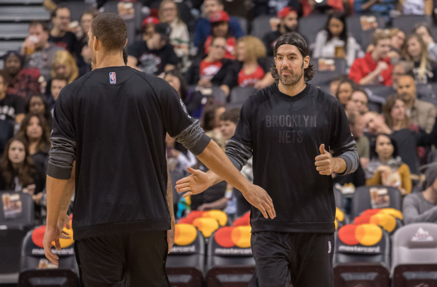 Jan 13, 2017; Toronto, Ontario, CAN; Brooklyn Nets forward Luis Scola (4) warms up with Brooklyn Nets center Brook Lopez (11) before a game against the Toronto Raptors at Air Canada Centre. The Toronto Raptors won 132-113. Mandatory Credit: Nick Turchiaro-USA TODAY Sports