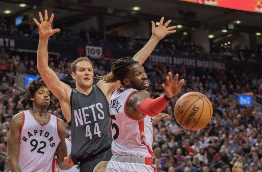 Jan 13, 2017; Toronto, Ontario, CAN; Brooklyn Nets guard Bojan Bogdanovic (44) battles for a ball with Toronto Raptors forward DeMarre Carroll (5) during the fourth quarter in a game at Air Canada Centre.The Toronto Raptors won 132-113. Mandatory Credit: Nick Turchiaro-USA TODAY Sports