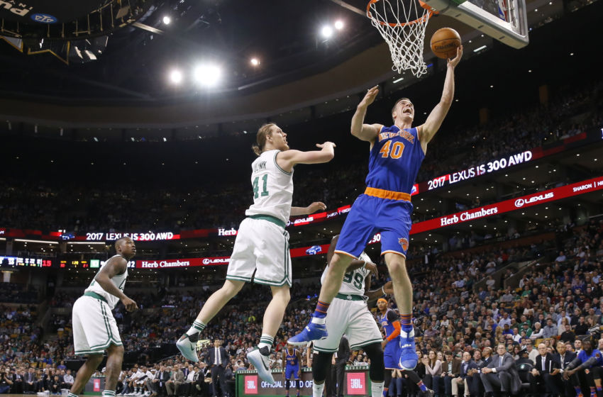 Jan 18, 2017; Boston, MA, USA; New York Knicks center Marshall Plumlee (40) shoots against Boston Celtics center Kelly Olynyk (41) in the first quarter at TD Garden. Mandatory Credit: David Butler II-USA TODAY Sports