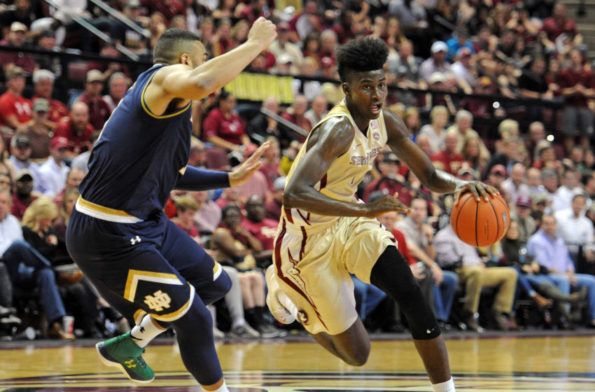 Jan 18, 2017; Tallahassee, FL, USA; Florida State Seminoles forward Jonathan Isaac (1) drives against Notre Dame Fighting Irish forward Austin Torres (1) during the second half at the Donald L. Tucker Center. Mandatory Credit: Melina Vastola-USA TODAY Sports
