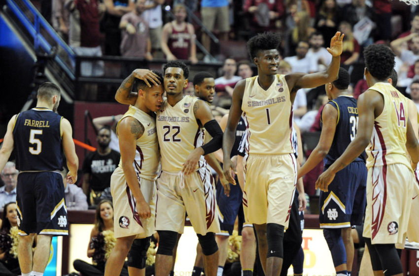 Jan 18, 2017; Tallahassee, FL, USA; Florida State Seminoles guard CJ walker (2) and guard Xavier Rathan-Mayes (22) and forward Jonathan Isaac (1) celebrate after a play against the Notre Dame Fighting Irish during the second half at the Donald L. Tucker Center. Mandatory Credit: Melina Vastola-USA TODAY Sports