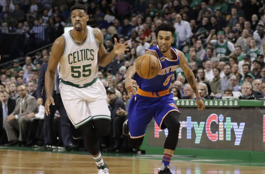 Jan 18, 2017; Boston, MA, USA; New York Knicks guard Courtney Lee (5) steals the ball from Boston Celtics forward Jordan Mickey (55) in the second half at TD Garden. The Knicks defeated the Celtics 117-106. Mandatory Credit: David Butler II-USA TODAY Sports