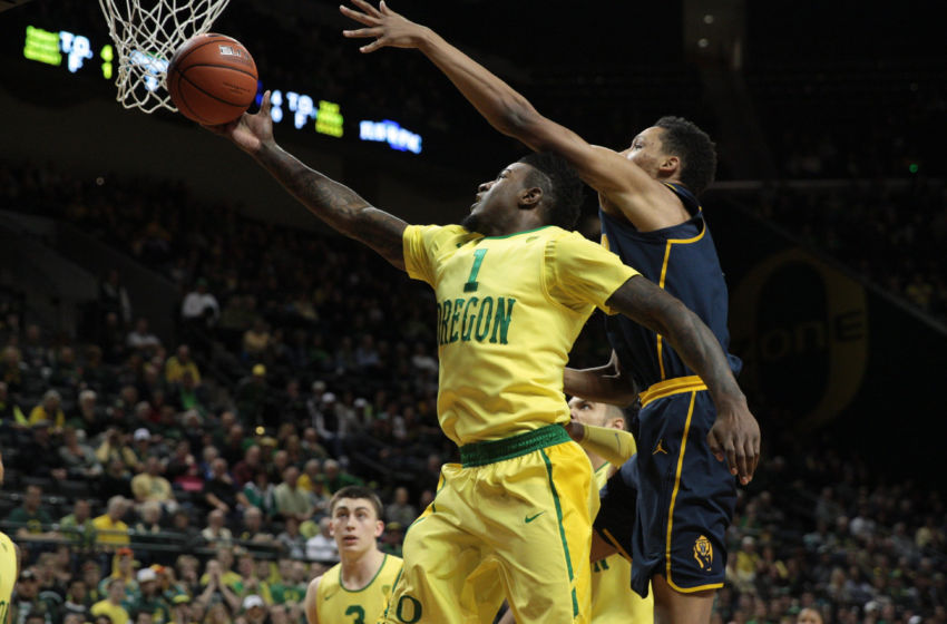 Jan 19, 2017; Eugene, OR, USA; Oregon Ducks forward Jordan Bell (1) and California Golden Bears forward Ivan Rabb (1) battle for the ball in the first half at Matthew Knight Arena. Mandatory Credit: Scott Olmos-USA TODAY Sports