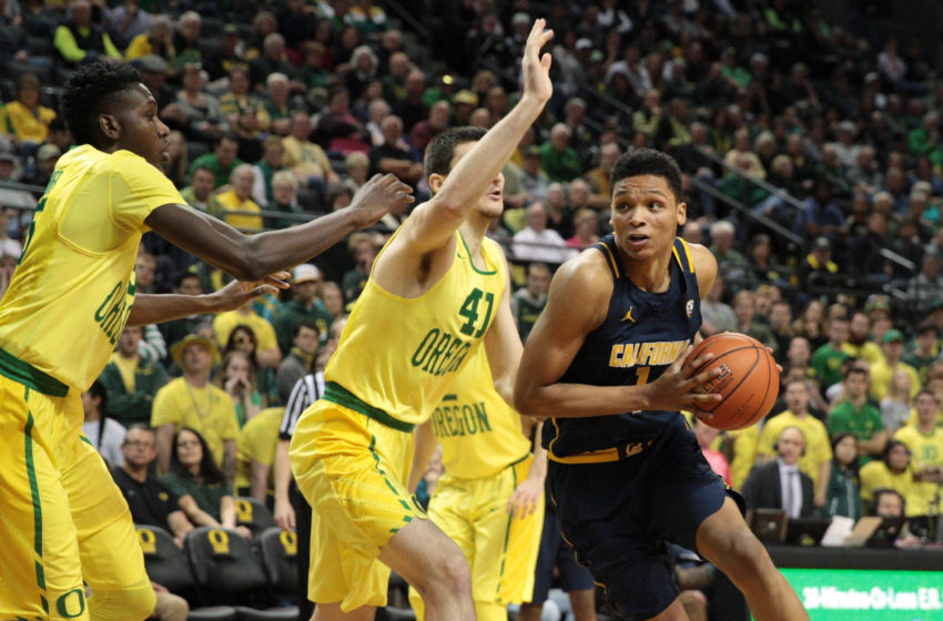 Jan 19, 2017; Eugene, OR, USA; Oregon Ducks forward Roman Sorkin (41) and Oregon Ducks forward Chris Boucher (25) defend as California Golden Bears forward Ivan Rabb (1) dribbles the ball in the first half at Matthew Knight Arena. Mandatory Credit: Scott Olmos-USA TODAY Sports