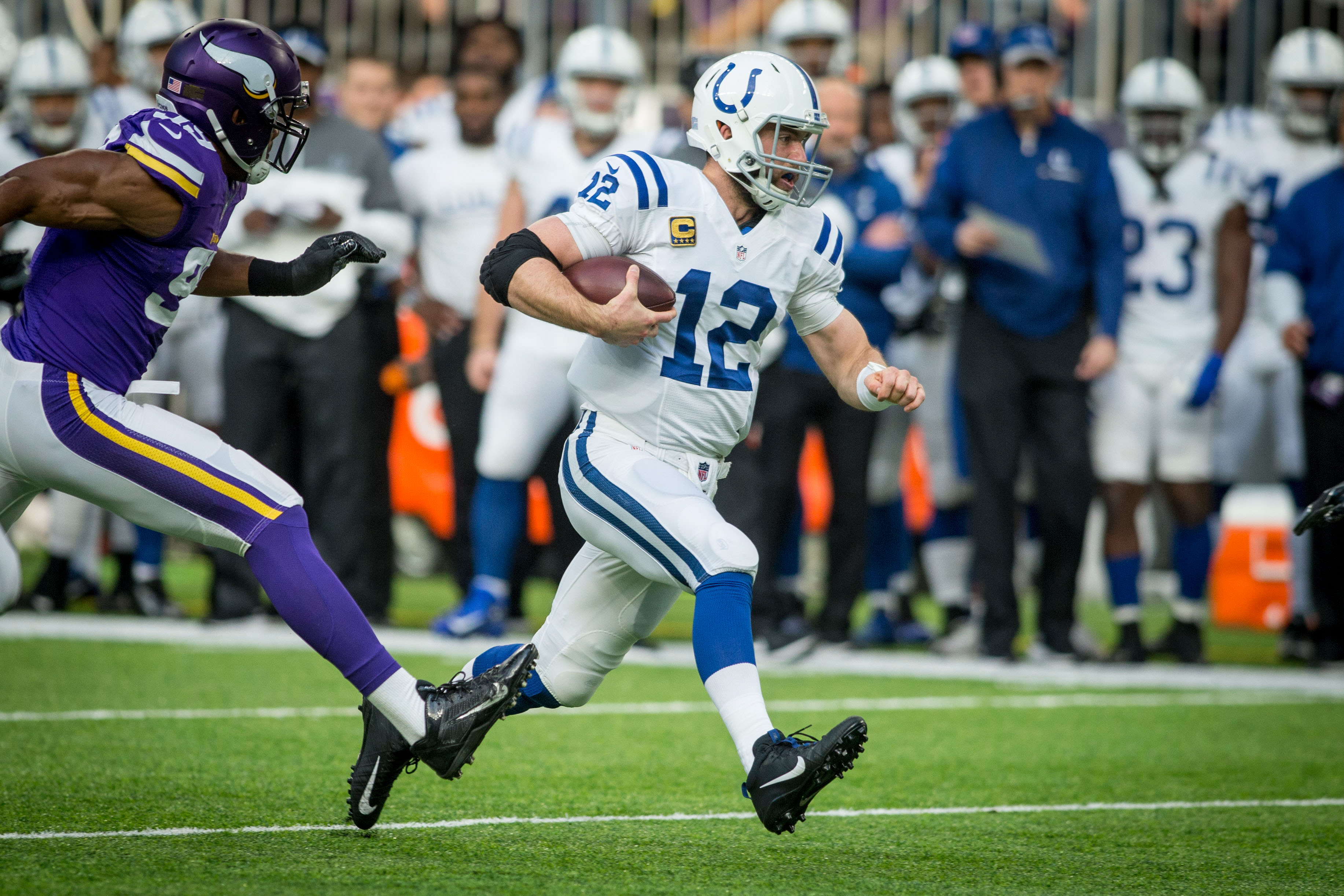 Dec 18, 2016; Minneapolis, MN, USA; Indianapolis Colts quarterback Andrew Luck (12) scrambles against the Minnesota Vikings in the first quarter at U.S. Bank Stadium. The Colts win 34-6. Mandatory Credit: Bruce Kluckhohn-USA TODAY Sports