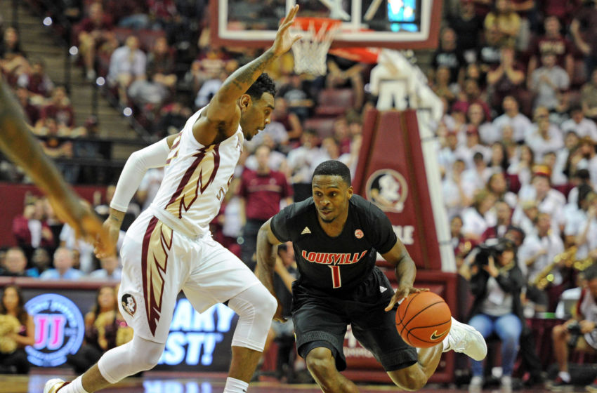 Jan 21, 2017; Tallahassee, FL, USA; Louisville Cardinals guard Tony Hicks (1) moves the ball past Florida State Seminoles guard Xavier Rathan-Mayes (22) during the first half at the Donald L. Tucker Center. Mandatory Credit: Melina Vastola-USA TODAY Sports