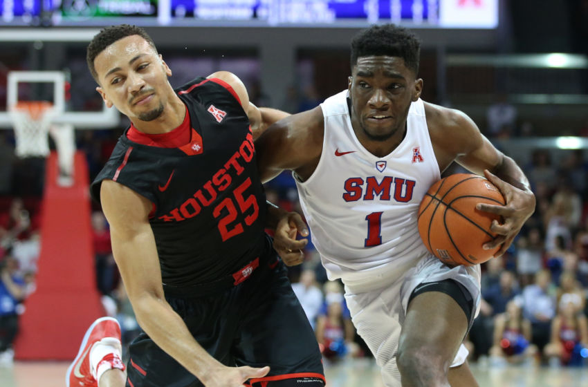 Jan 21, 2017; Dallas, TX, USA; Southern Methodist Mustangs guard Shake Milton (1) drives on Houston Cougars guard Galen Robinson Jr. (25) in the second half at Moody Coliseum. Mandatory Credit: Tim Heitman-USA TODAY Sports
