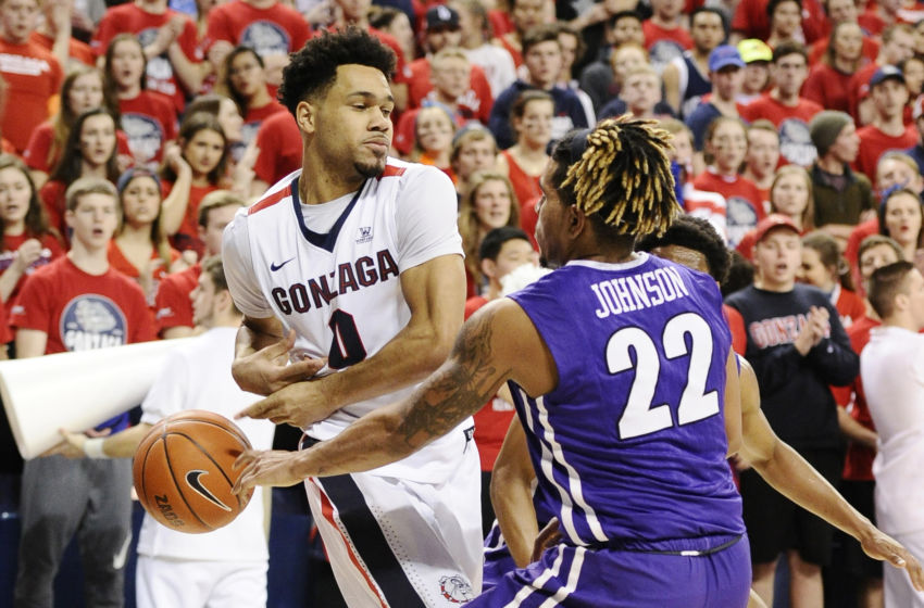 Jan 21, 2017; Spokane, WA, USA; Portland Pilots guard Jazz Johnson (22) knocks the ball away from Gonzaga Bulldogs guard Silas Melson (0) during the first half at McCarthey Athletic Center. Mandatory Credit: James Snook-USA TODAY Sports