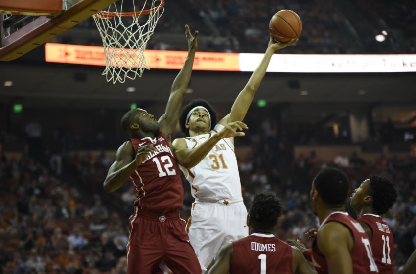 Jan 23, 2017; Austin, TX, USA; Texas Longhorns forward Jarrett Allen (31) shoots against Oklahoma Sooners forwards Kadeem Lattin (12) during the first half at the Frank Erwin Center. Mandatory Credit: Brendan Maloney-USA TODAY Sports