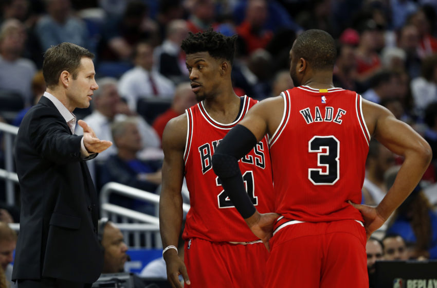 Jan 24, 2017; Orlando, FL, USA; Chicago Bulls head coach Fred Hoiberg talks with Chicago Bulls forward Jimmy Butler (21) and guard Dwyane Wade (3) during the second quarter at Amway Center. Mandatory Credit: Kim Klement-USA TODAY Sports