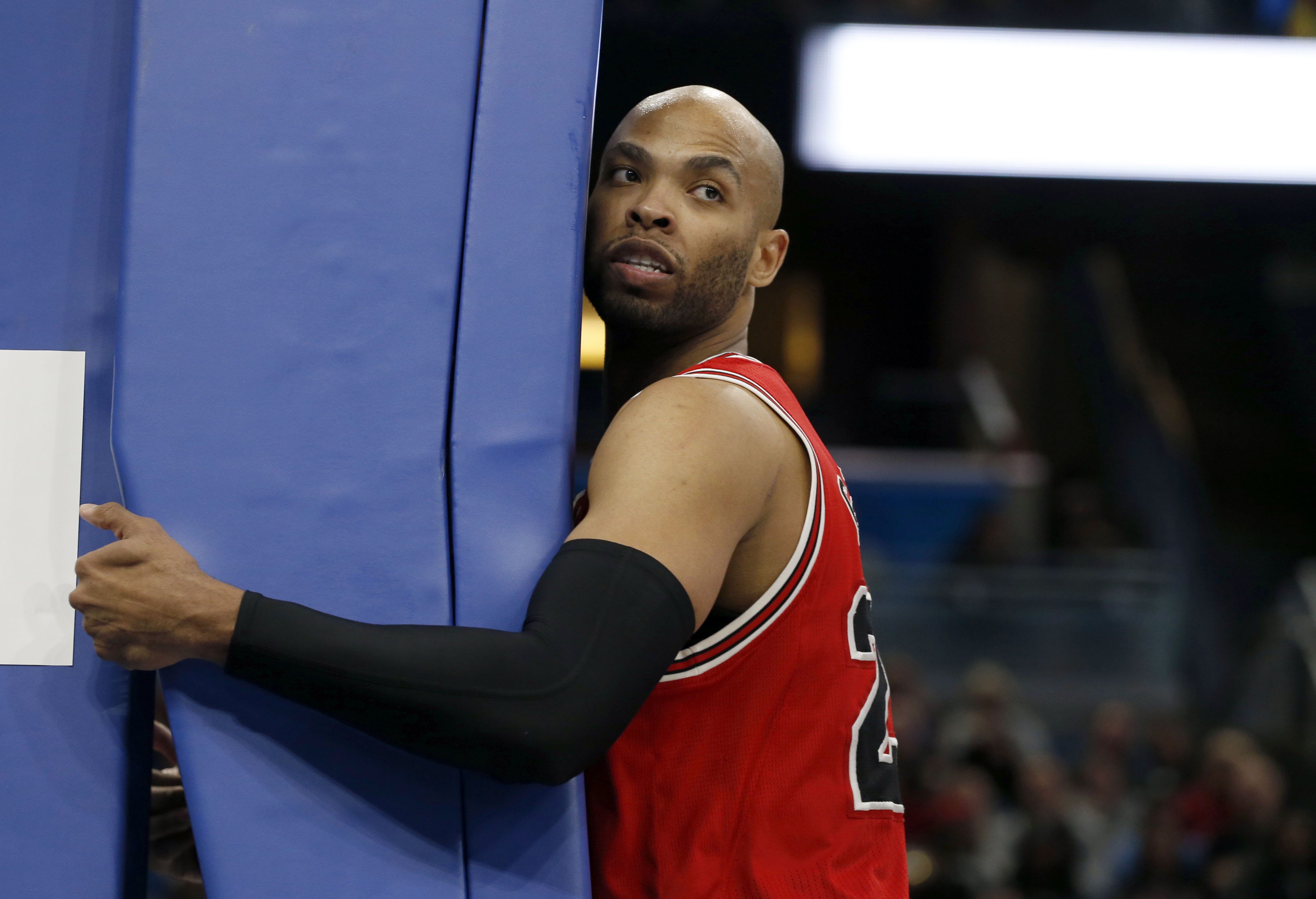Jan 24, 2017; Orlando, FL, USA; Chicago Bulls forward Taj Gibson (22) holds onto the basket post after being fouled during the second half at Amway Center. The Bulls won 100-92. Mandatory Credit: Kim Klement-USA TODAY Sports