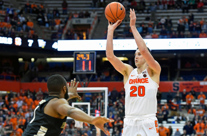 Jan 24, 2017; Syracuse, NY, USA; Syracuse Orange forward Tyler Lydon (20) shoots the ball over Wake Forest Demon Deacons guard Keyshawn Woods (1) during the second half at the Carrier Dome. The Orange won 81-76. Mandatory Credit: Rich Barnes-USA TODAY Sports