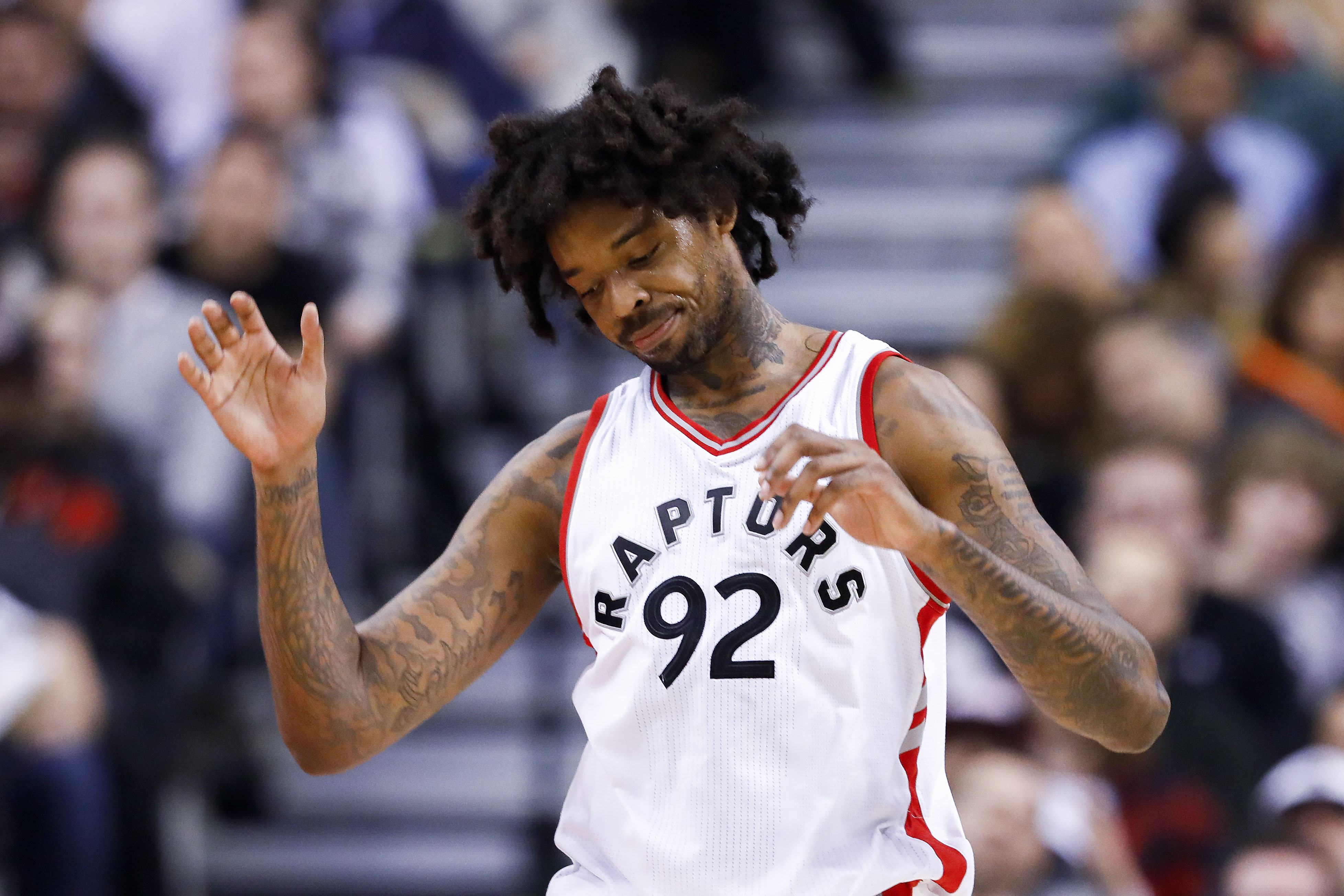 Jan 24, 2017; Toronto, Ontario, CAN; Toronto Raptors center Lucas Nogueira (92) reacts after taking a foul against the San Antonio Spurs in the first half at Air Canada Centre. Spurs defeat the Raptors 108-106. Mandatory Credit: Kevin Sousa-USA TODAY Sports