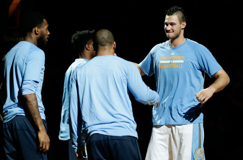 Jan 21, 2017; Denver, CO, USA; Denver Nuggets forward Danilo Gallinari (right) is introduced with teammates before the game against the Los Angeles Clippers at the Pepsi Center. The Nuggets won 123-98. Mandatory Credit: Isaiah J. Downing-USA TODAY Sports