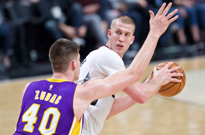 Jan 25, 2017; Portland, OR, USA; Portland Trail Blazers center Mason Plumlee (24) looks for a pass around Los Angeles Lakers center Ivica Zubac (40) during the third quarter at the Moda Center. Mandatory Credit: Craig Mitchelldyer-USA TODAY Sports