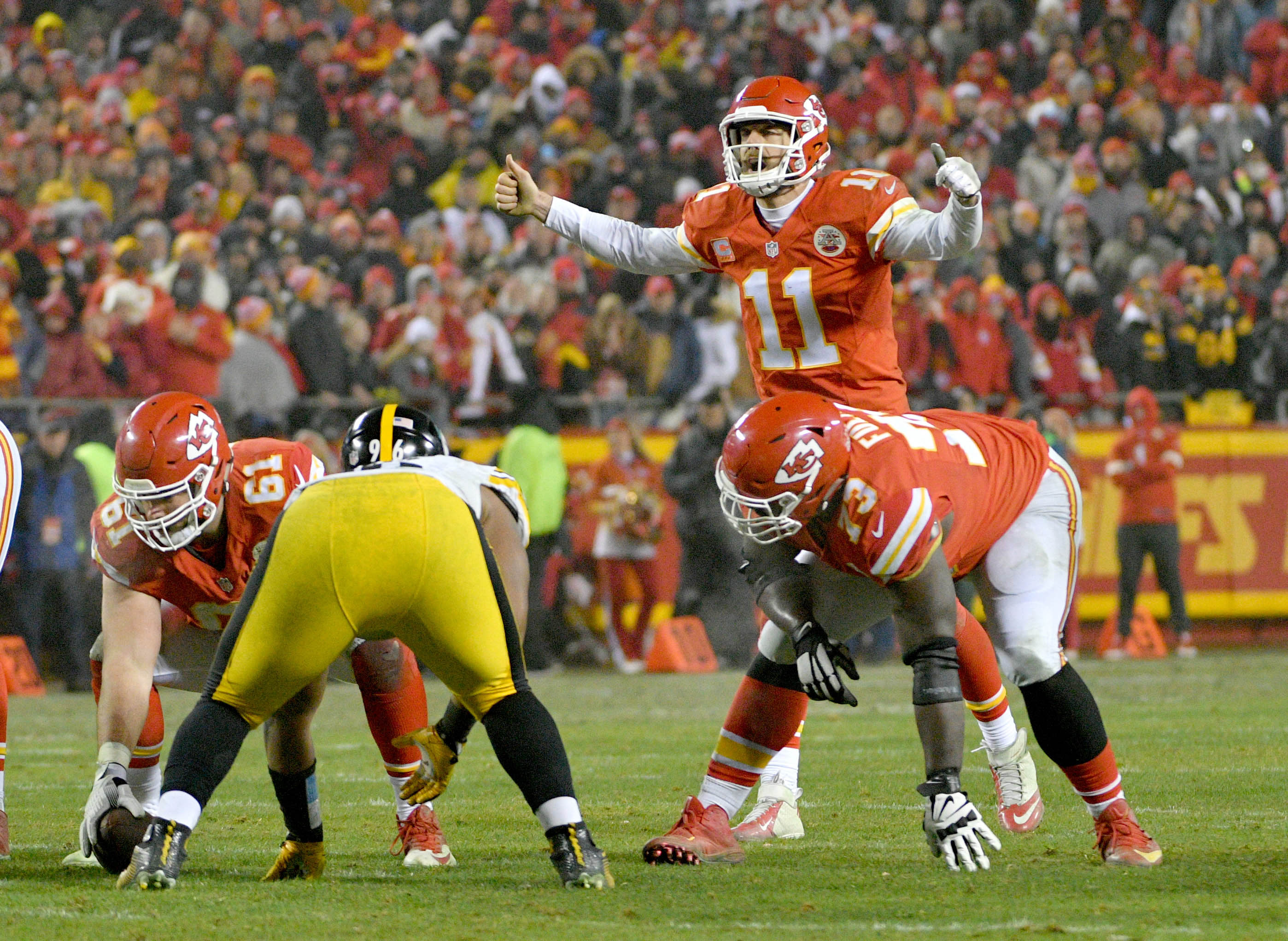 Jan 15, 2017; Kansas City, MO, USA; Kansas City Chiefs quarterback Alex Smith (11) signals on the line of scrimmage in the AFC Divisional playoff game against the Pittsburgh Steelers at Arrowhead Stadium. Pittsburgh won 18-16. Mandatory Credit: Denny Medley-USA TODAY Sports