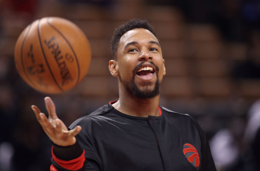 Jan 22, 2017; Toronto, Ontario, CAN; Toronto Raptors forward Jared Sullinger (0) laughs as he warms up before playing against the Phoenix Suns at Air Canada Centre. The Suns beat the Raptors 115-103. Mandatory Credit: Tom Szczerbowski-USA TODAY Sports