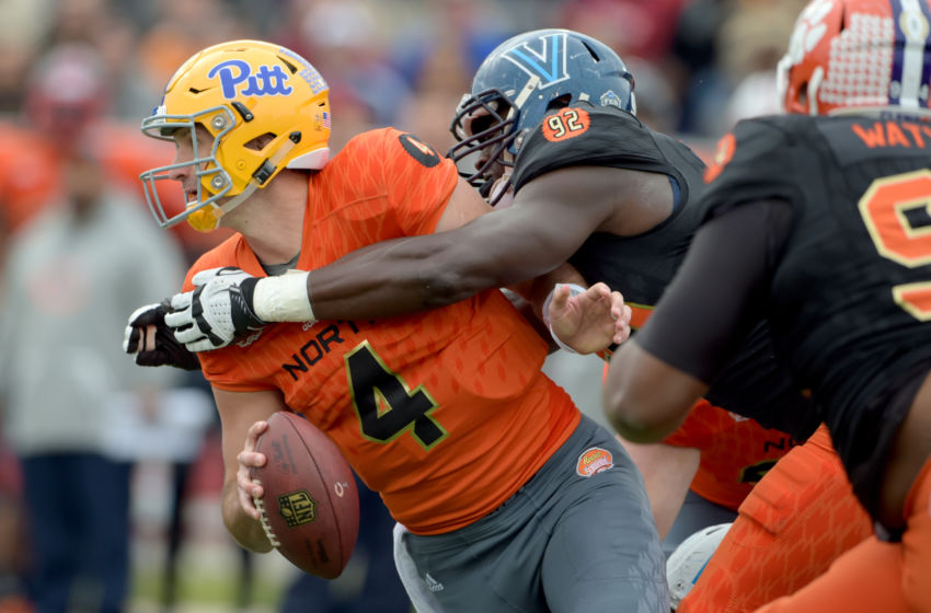 Jan 28, 2017; Mobile, AL, USA; North squad quarterback Nate Peterman of Pittsburgh (4) is pressured by South squad defensive end Tanoh Kpassagnon of Villanova (92) during the first quarter of the 2017 Senior Bowl at Ladd-Peebles Stadium. Mandatory Credit: Glenn Andrews-USA TODAY Sports