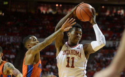 Jan 28, 2017; Norman, OK, USA; Oklahoma Sooners forward Kristian Doolittle (11) attempts a shot in front of Florida Gators guard Kasey Hill (0) during the second half at Lloyd Noble Center. Mandatory Credit: Mark D. Smith-USA TODAY Sports