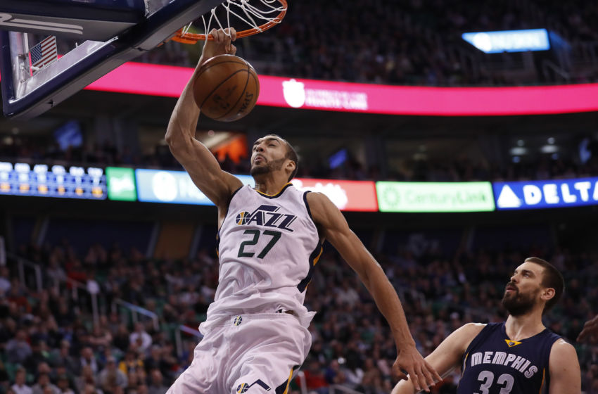 Jan 28, 2017; Salt Lake City, UT, USA; Utah Jazz center Rudy Gobert (27) dunks the ball against Memphis Grizzlies center Marc Gasol (33) in the fourth quarter at Vivint Smart Home Arena. The Memphis Grizzlies defeated the Utah Jazz 102-95. Mandatory Credit: Jeff Swinger-USA TODAY Sports