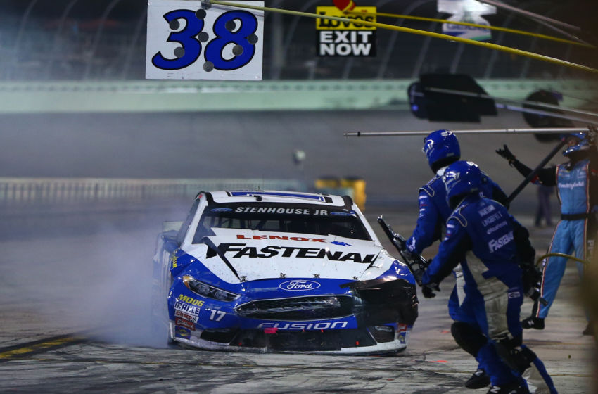 Nov 20, 2016; Homestead, FL, USA; NASCAR Sprint Cup Series driver Ricky Stenhouse Jr pits to repair damage after crashing during the Ford Ecoboost 400 at Homestead-Miami Speedway. Mandatory Credit: Mark J. Rebilas-USA TODAY Sports