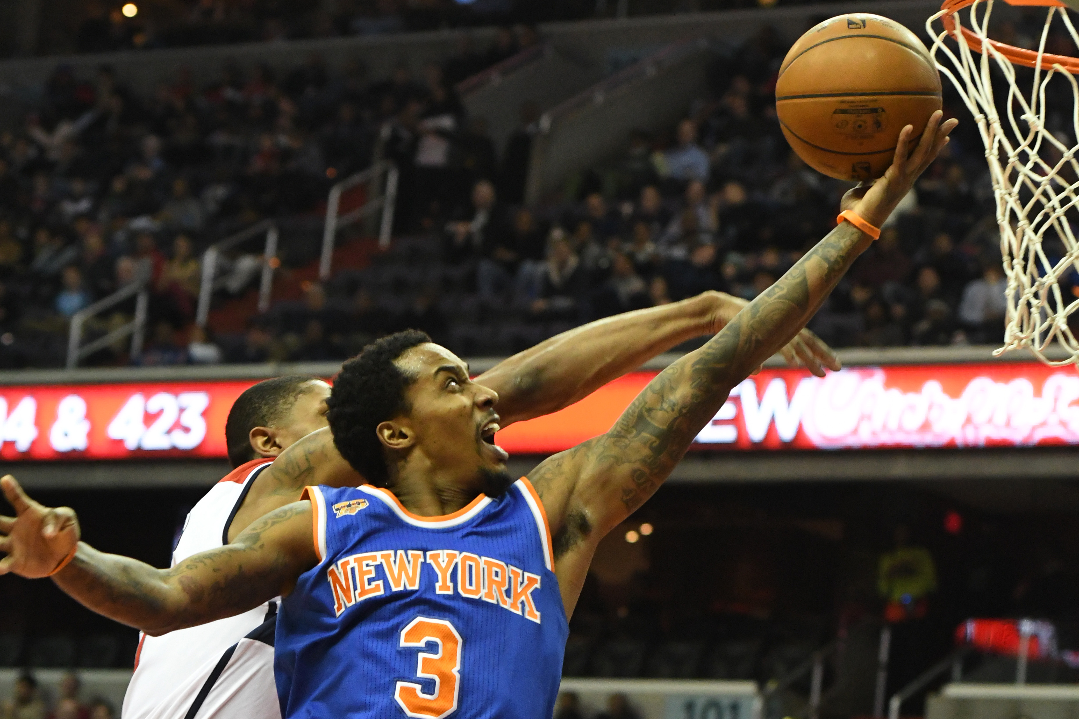 Jan 31, 2017; Washington, DC, USA; New York Knicks guard Brandon Jennings (3) shoots as Washington Wizards forward Otto Porter Jr. (22) defends during the first quarter at Verizon Center. Mandatory Credit: Tommy Gilligan-USA TODAY Sports