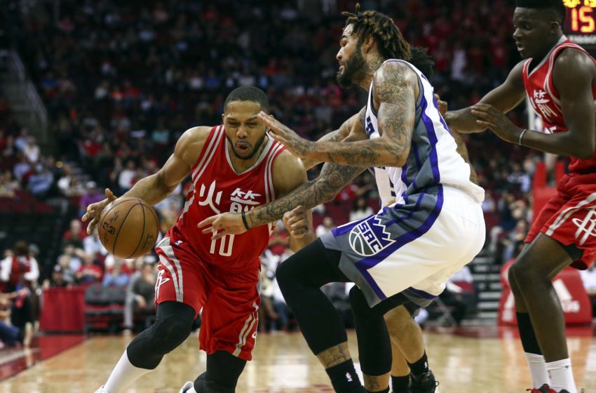 Jan 31, 2017; Houston, TX, USA; Houston Rockets guard Eric Gordon (10) dribbles the ball as Sacramento Kings center Willie Cauley-Stein (00) defends during the second quarter at Toyota Center. Mandatory Credit: Troy Taormina-USA TODAY Sports