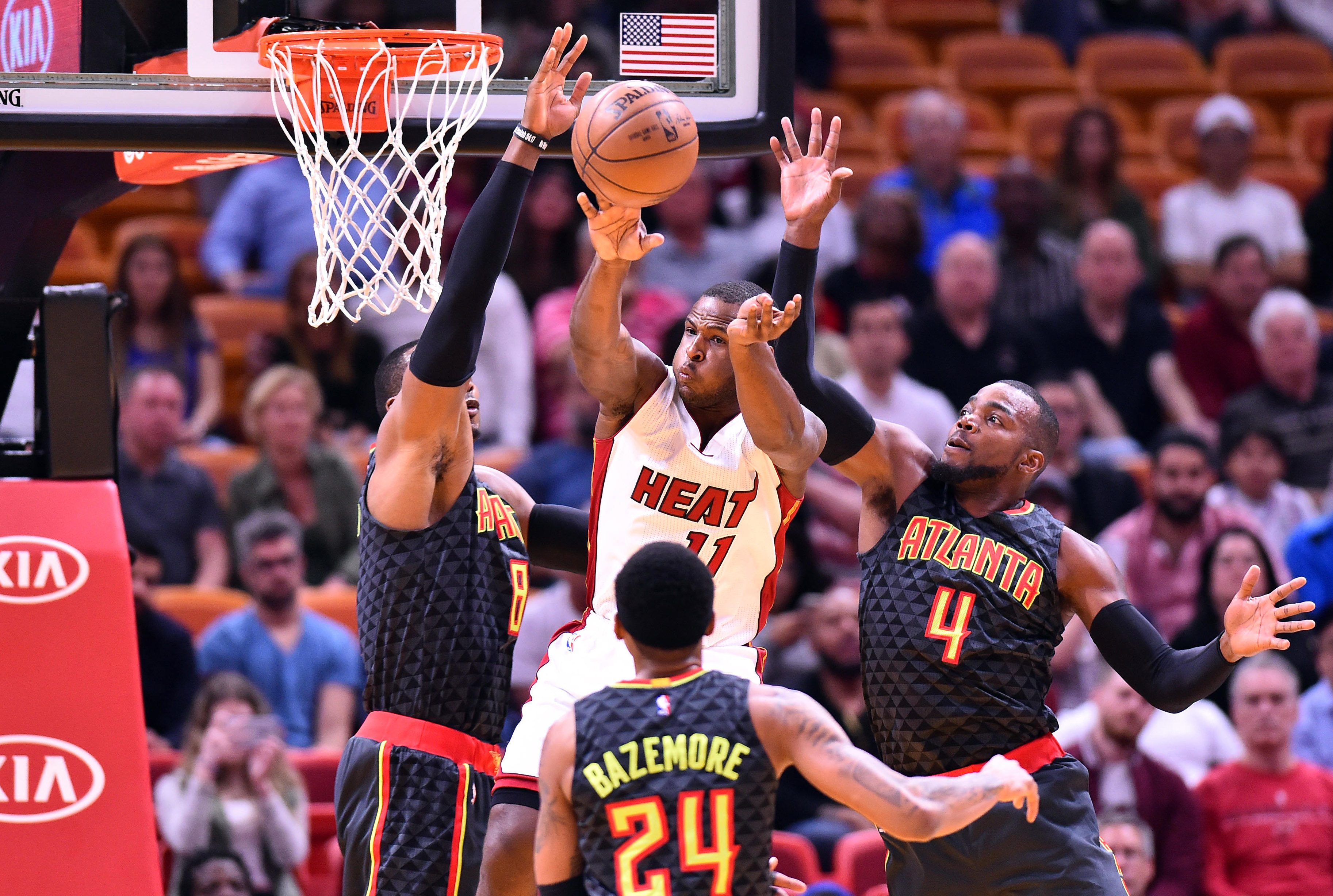 Feb 1, 2017; Miami, FL, USA; Miami Heat guard Dion Waiters (C) is pressured by Atlanta Hawks center Dwight Howard (L) and Atlanta Hawks forward Paul Millsap (R) during the first half at American Airlines Arena. Mandatory Credit: Steve Mitchell-USA TODAY Sports