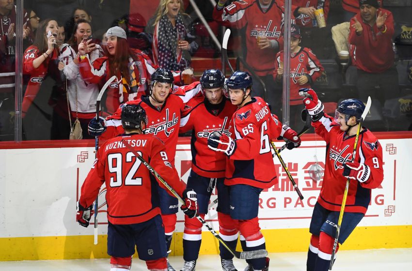 Feb 1, 2017; Washington, DC, USA; Washington Capitals right wing Brett Connolly (10) is congratulated by teammates after scoring a goal against the Boston Bruins during the third period at Verizon Center. Washington Capitals won 5-3. Mandatory Credit: Brad Mills-USA TODAY Sports