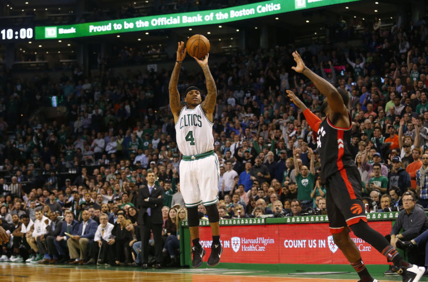 Feb 1, 2017; Boston, MA, USA; Boston Celtics guard Isaiah Thomas (4) hits a shot past Toronto Raptors forward Patrick Patterson (54) late in the fourth quarter at TD Garden. Mandatory Credit: Winslow Townson-USA TODAY Sports