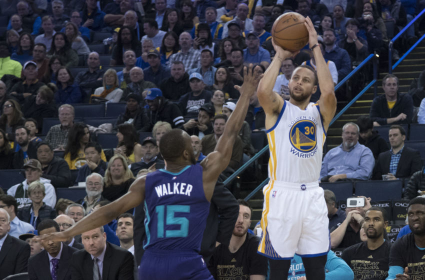 February 1, 2017; Oakland, CA, USA; Golden State Warriors guard Stephen Curry (30) shoots the basketball against Charlotte Hornets guard Kemba Walker (15) during the third quarter at Oracle Arena. The Warriors defeated the Hornets 126-111. Mandatory Credit: Kyle Terada-USA TODAY Sports