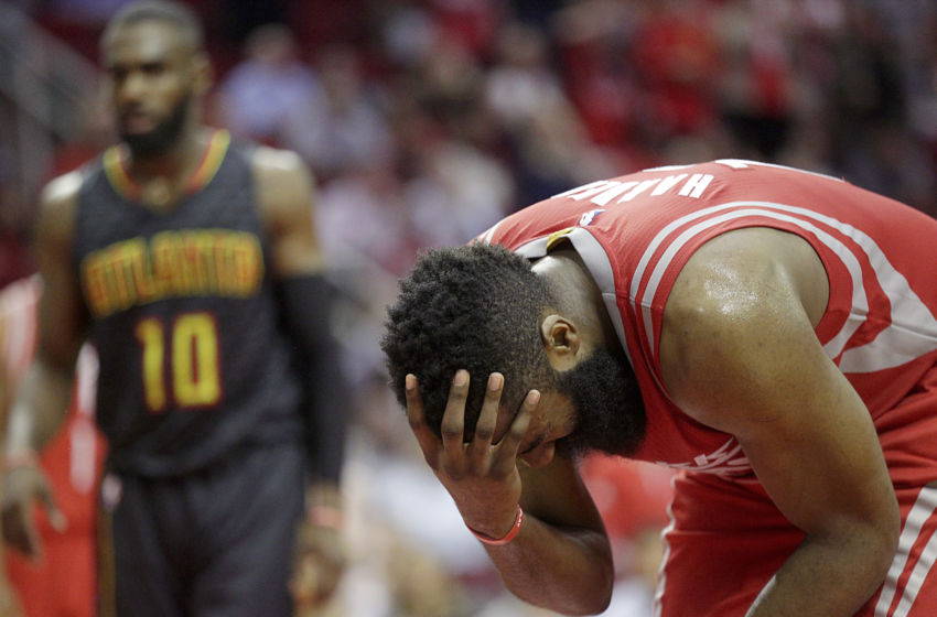 Feb 2, 2017; Houston, TX, USA; Houston Rockets guard James Harden (13) holds his head after injuring it agains the Atlanta Hawks in the second half at Toyota Center. Atlanta Hawks won 113 to 108. Mandatory Credit: Thomas B. Shea-USA TODAY Sports