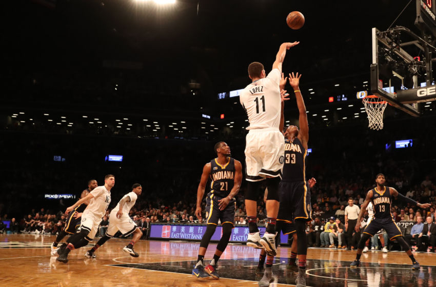 Feb 3, 2017; Brooklyn, NY, USA; Brooklyn Nets center Brook Lopez (11) shoots over Indiana Pacers center Myles Turner (33) during the third quarter at Barclays Center. Indiana Pacers won 106-97. Mandatory Credit: Anthony Gruppuso-USA TODAY Sports