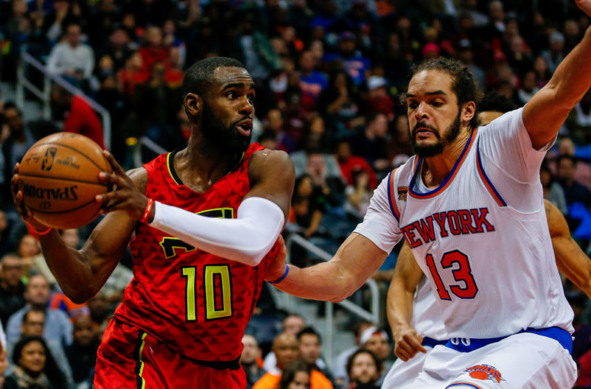 Jan 29, 2017; Atlanta, GA, USA; Atlanta Hawks guard Tim Hardaway Jr. (10) drives the baseline around New York Knicks center Joakim Noah (13) during the second half at Philips Arena. Mandatory Credit: Butch Dill-USA TODAY Sports