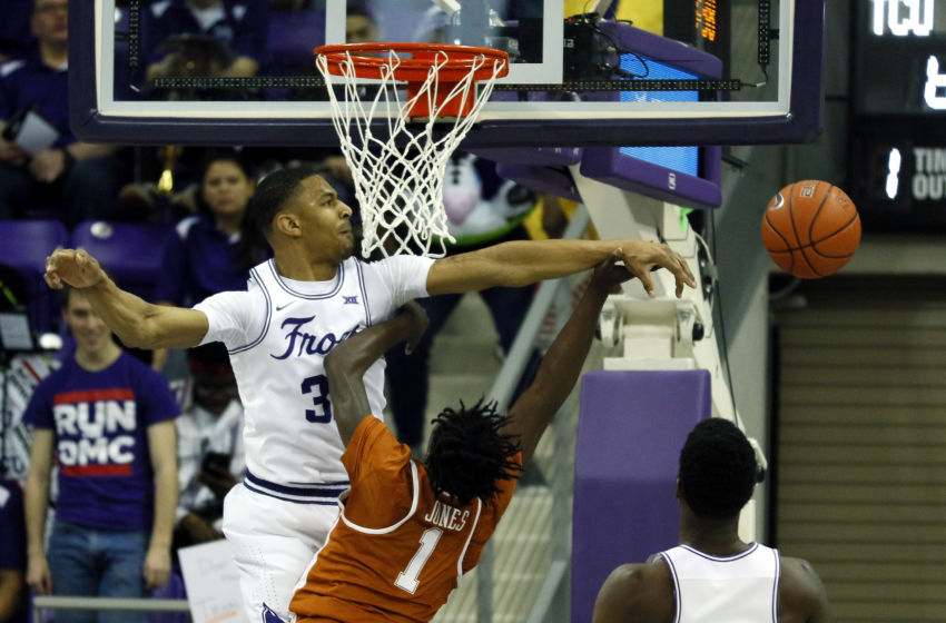 Feb 4, 2017; Fort Worth, TX, USA; TCU Horned Frogs forward Karviar Shepherd (32) is called for the foul after blocking the shot of Texas Longhorns guard Andrew Jones (1) during the second half at Ed and Rae Schollmaier Arena. TCU won 78-63. Mandatory Credit: Ray Carlin-USA TODAY Sports