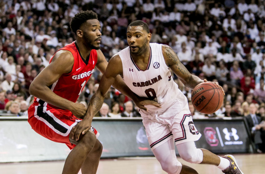 Feb 4, 2017; Columbia, SC, USA; South Carolina Gamecocks guard Sindarius Thornwell (0) drives around Georgia Bulldogs forward Yante Maten (1) in the second half at Colonial Life Arena. Mandatory Credit: Jeff Blake-USA TODAY Sports