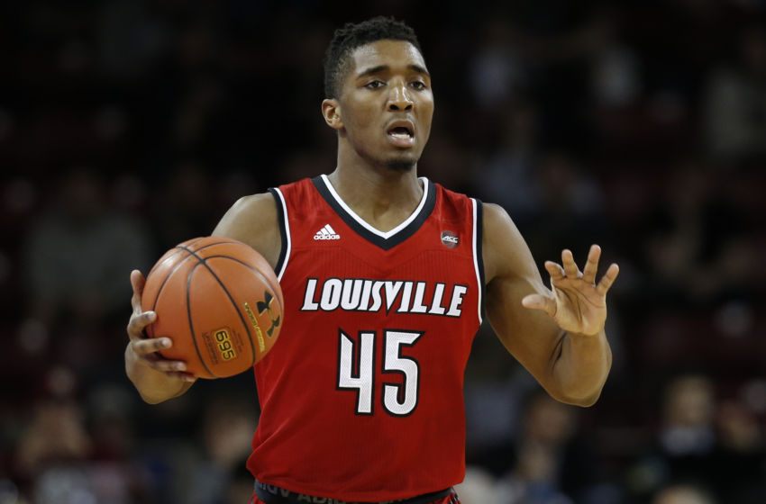 Feb 4, 2017; Chestnut Hill, MA, USA; Louisville Cardinals guard Donovan Mitchell (45) controls the ball during the second half against the Boston College Eagles at Silvio O. Conte Forum. The Louisville Cardinals won 90-67. Mandatory Credit: Greg M. Cooper-USA TODAY Sports