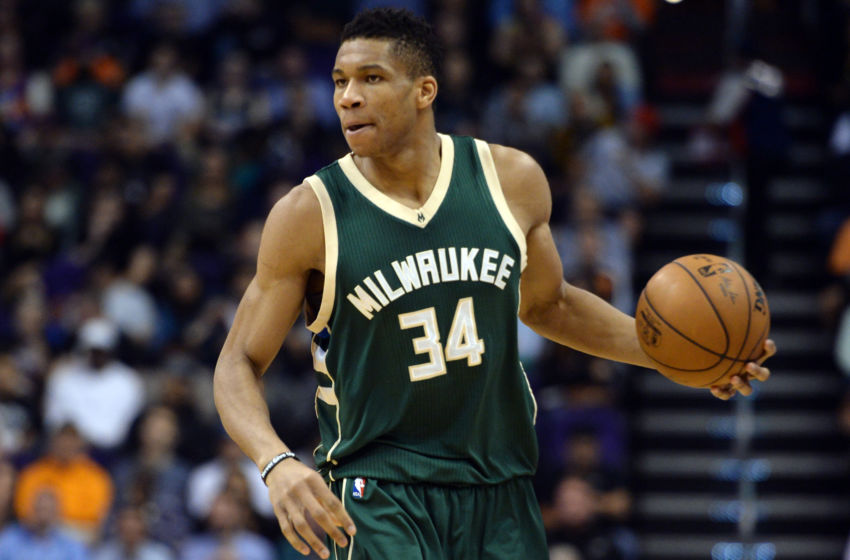 Feb 4, 2017; Phoenix, AZ, USA; Milwaukee Bucks forward Giannis Antetokounmpo (34) dribbles the ball against the Phoenix Suns during the first half at Talking Stick Resort Arena. Mandatory Credit: Joe Camporeale-USA TODAY Sports