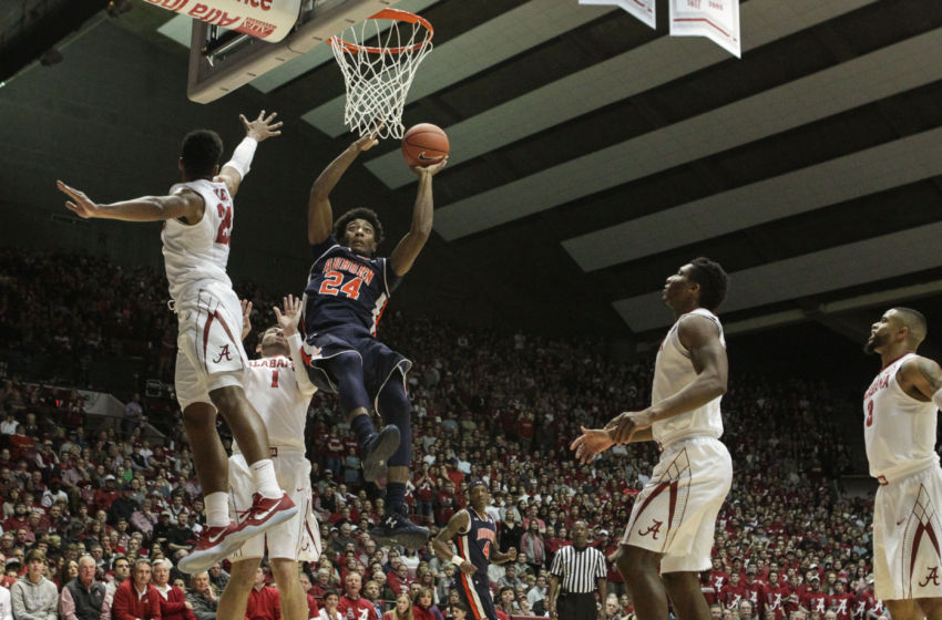 Feb 4, 2017; Tuscaloosa, AL, USA; Auburn Tigers forward Anfernee McLemore (24) goes to the basket during the first half at Coleman Coliseum against Alabama Crimson Tide . The Tigers defeated the Tide 82-77. Mandatory Credit: Marvin Gentry-USA TODAY Sports