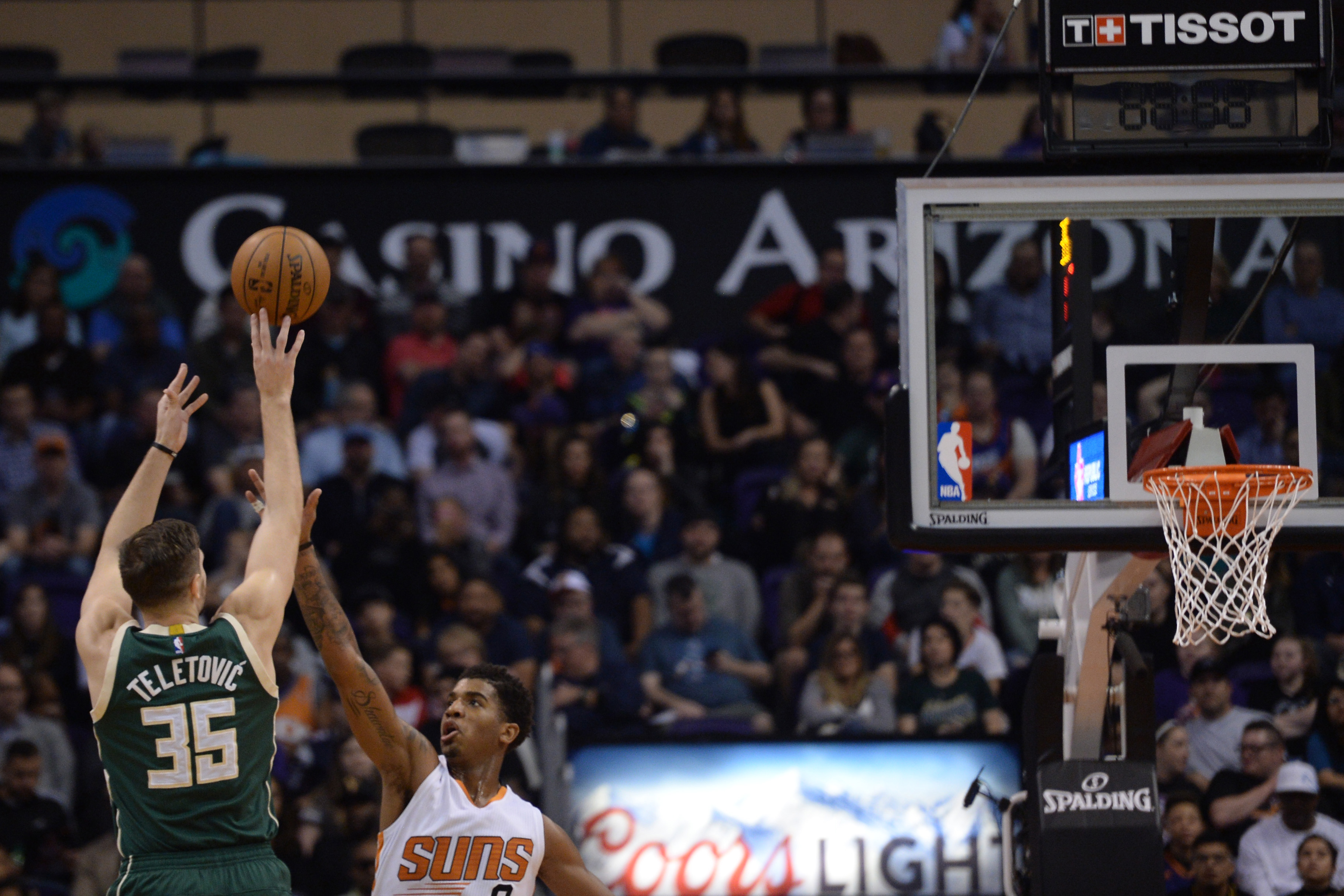 Feb 4, 2017; Phoenix, AZ, USA; Milwaukee Bucks forward Mirza Teletovic (35) shoots over Phoenix Suns forward Marquese Chriss (0) during the second half at Talking Stick Resort Arena. The Bucks won 137-112. Mandatory Credit: Joe Camporeale-USA TODAY Sports