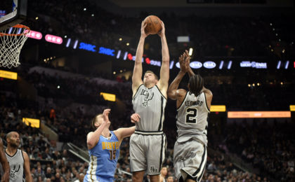 Feb 4, 2017; San Antonio, TX, USA; San Antonio Spurs forward David Lee (10) grabs a rebound against the Denver Nuggets during the second half at the AT&T Center. The Spurs won 121-97. Mandatory Credit: Brendan Maloney-USA TODAY Sports