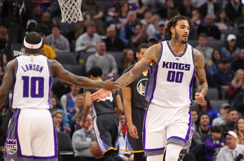 Feb 4, 2017; Sacramento, CA, USA; Sacramento Kings center Willie Cauley-Stein (00) celebrates with guard Ty Lawson (10) during the second quarter against the Golden State Warriors at Golden 1 Center. Mandatory Credit: Sergio Estrada-USA TODAY Sports