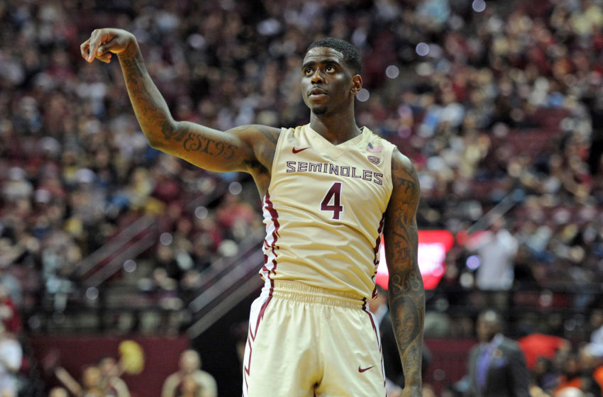 Feb 5, 2017; Tallahassee, FL, USA; Florida State Seminoles guard Dwayne Bacon (4) after a three point shot against the Clemson Tigers at the Donald L. Tucker Center. Mandatory Credit: Melina Vastola-USA TODAY Sports