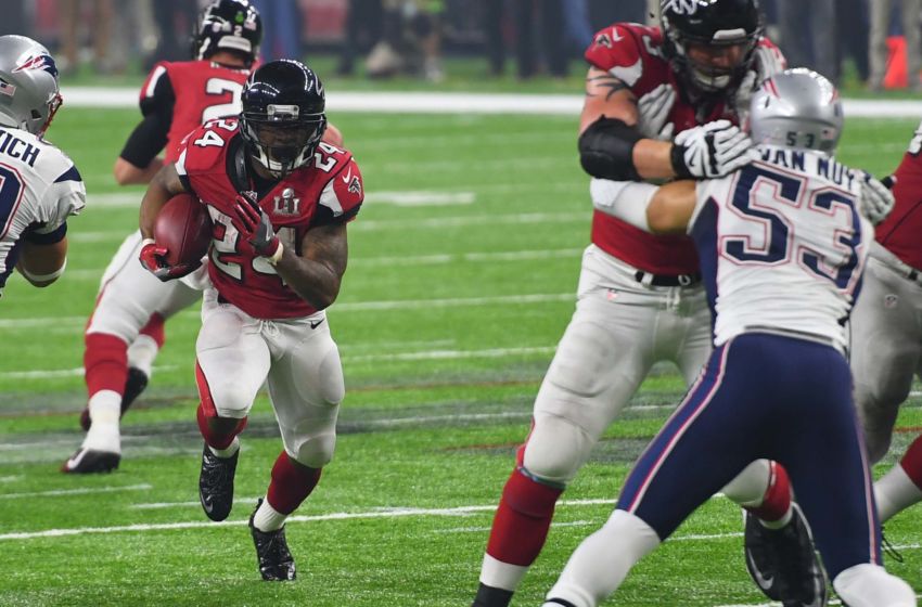 Feb 5, 2017; Houston, TX, USA; Atlanta Falcons running back Devonta Freeman (24) runs the ball during the third quarter against the New England Patriots during Super Bowl LI at NRG Stadium. Mandatory Credit: Bob Donnan-USA TODAY Sports