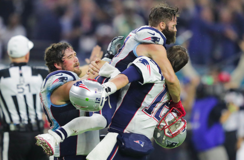 Feb 5, 2017; Houston, TX, USA; New England Patriots wide receiver Julian Edelman (11) and quarterback Tom Brady (12) celebrate their win over Atlanta Falcons during Super Bowl LI at NRG Stadium. The Patriots won 34-28. Mandatory Credit: Dan Powers-USA TODAY Sports
