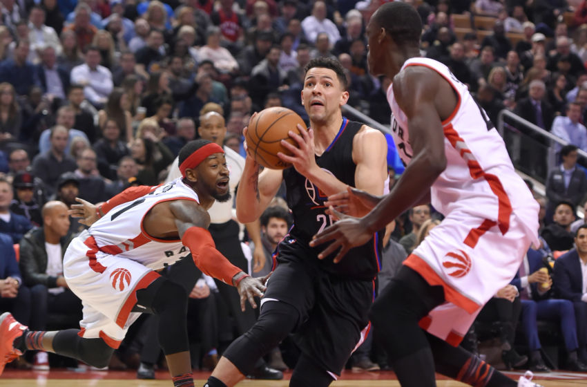 Feb 6, 2017; Toronto, Ontario, CAN; Los Angeles Clippers guard Austin Rivers (25) prepares to shoot the ball between Toronto Raptors guard Terrence Ross (31) and forward Pascal Siakam (43) in the first quarter at Air Canada Centre. Mandatory Credit: Dan Hamilton-USA TODAY Sports
